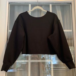 Lululemon black pullover sweatshirt. Twist style, size 4. Brand new (worn once)